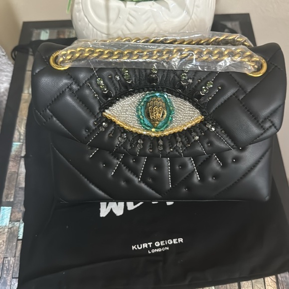 Kurt Geiger London
Mini Kensington Eye Crossbody Bag - Picture 13 of 15